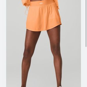 Alo yoga match point orange tennis skirt M